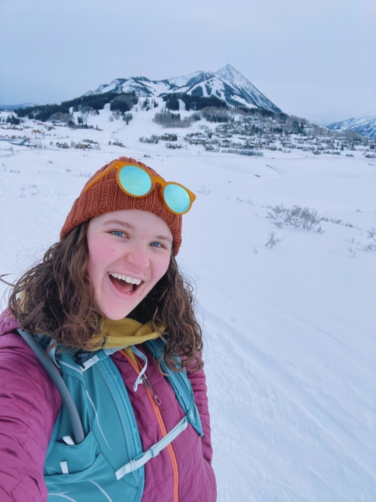 emma is wearing warm outdoor clothing