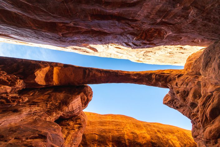 arches national park trail map surprise arch view from below with a blue sky