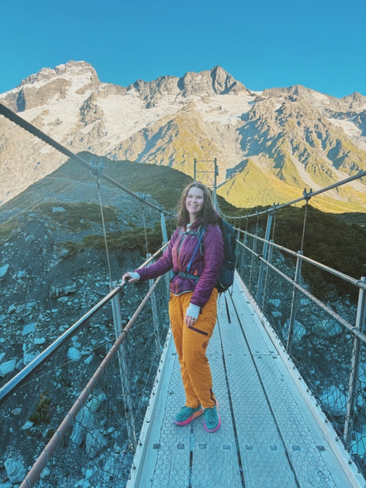 hiking day pack gear list emma in hooker valley wearing items on the day hike packing list