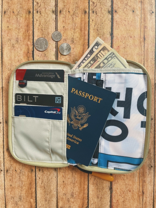 rfid blocking travel wallet with passport and credit cards. organize your money before traveling internationally.