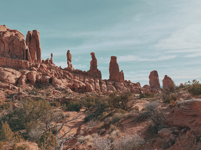 marching men in arches