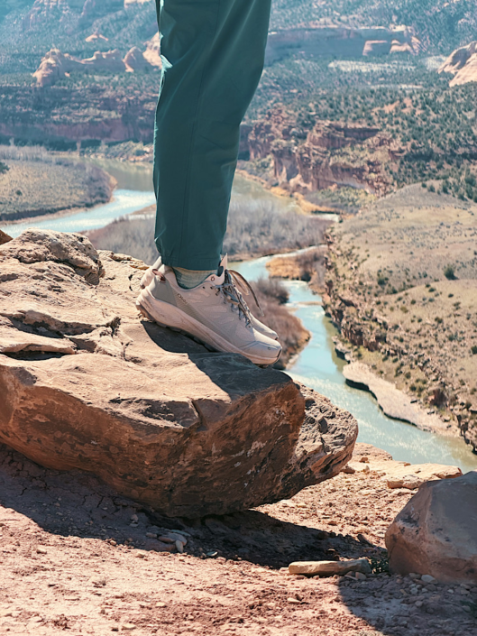trail runners for hiking on rocky terrain with canyon view showing grip and flexibility