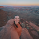 Taking a sunset selfie at Panorama Point in the Maze Utah with dramatic canyon views in the background