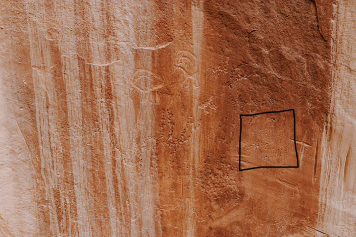 Ancient petroglyph loom carving among pecked rock images in Horseshoe Canyon Utah