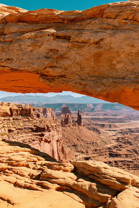 View through Mesa Arch overlooking Canyonlands National Park near Moab.