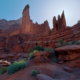 Fisher Towers Trail near Moab, Utah with the red rock towers backlit by the morning sun