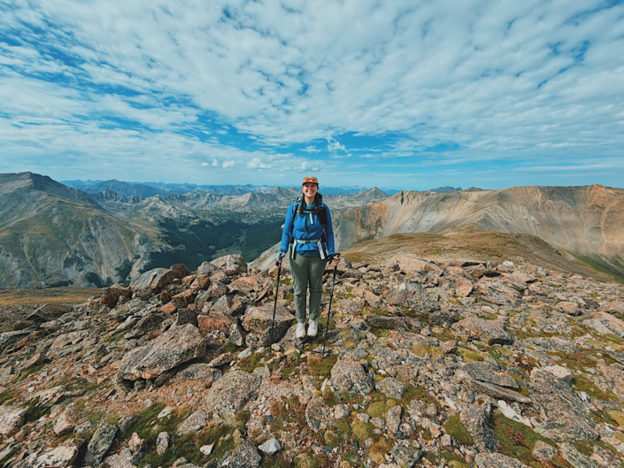 Standing at the summit of Mount Oxford 14er wearing Arc'teryx Gamma pants