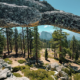 Half Dome framed through Indian Rock Arch on the North Dome Yosemite hike