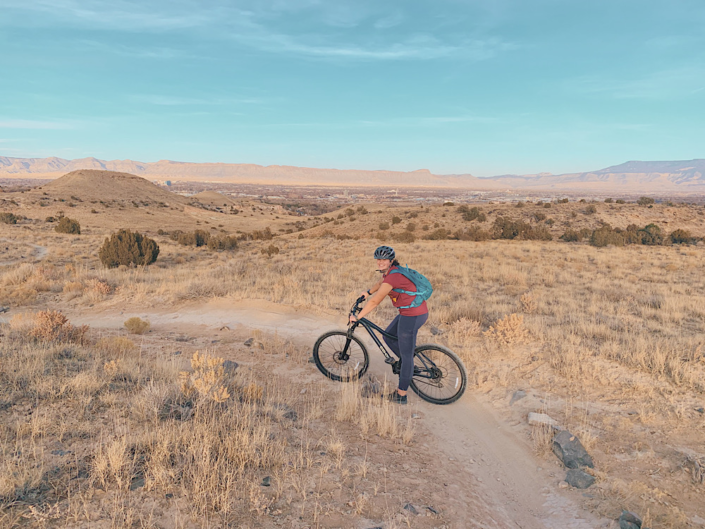Osprey Raven 10 backpack on a mountain biking trail