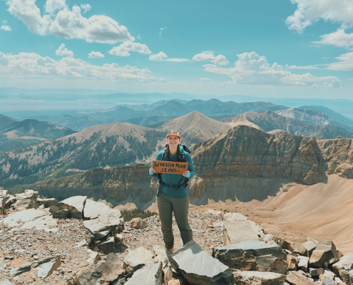 Hiker at the 13,065-foot Wheeler Peak summit in Great Basin National Park